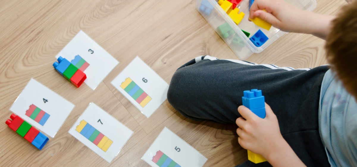 Child,Learning,To,Count,With,Lego,Blocks.