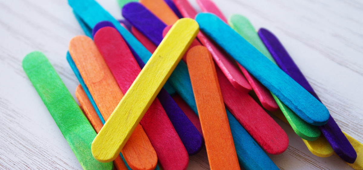 Colorful craft sticks to create patterns in hands on preschool math game