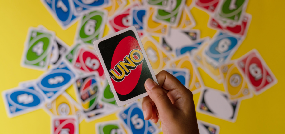 Deck of Uno Cards on table used for a preschool math game. 