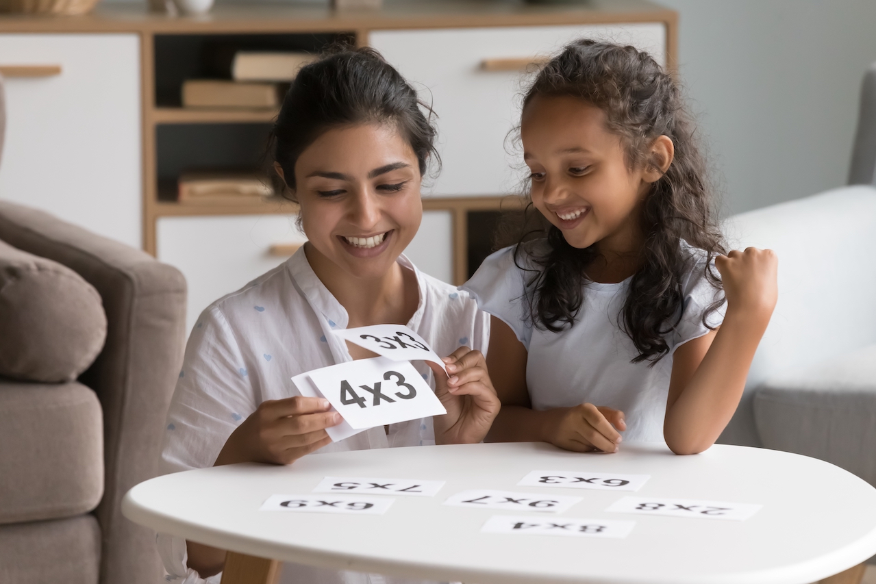 Mom teaching girl to count