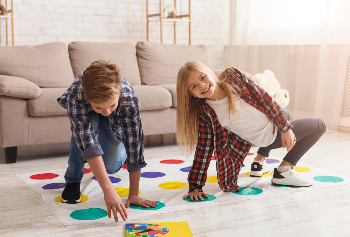 Kids playing twister. 