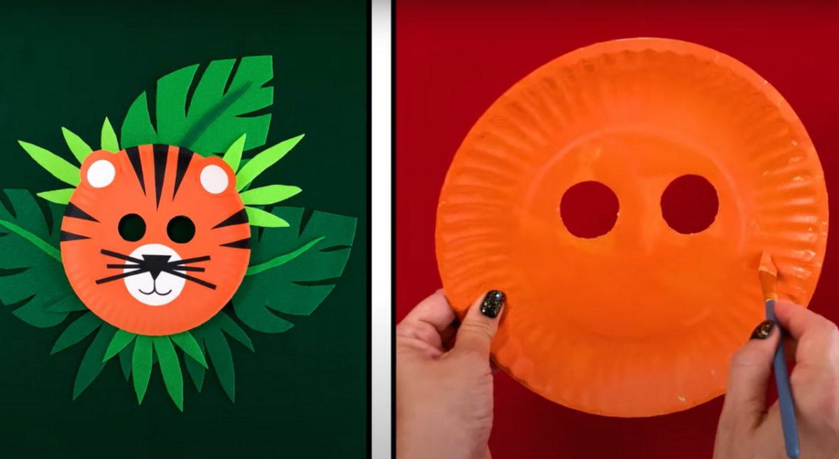 Painting the tiger mask orange. 