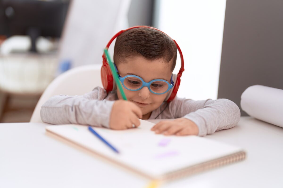 A boy practicing his writing. 