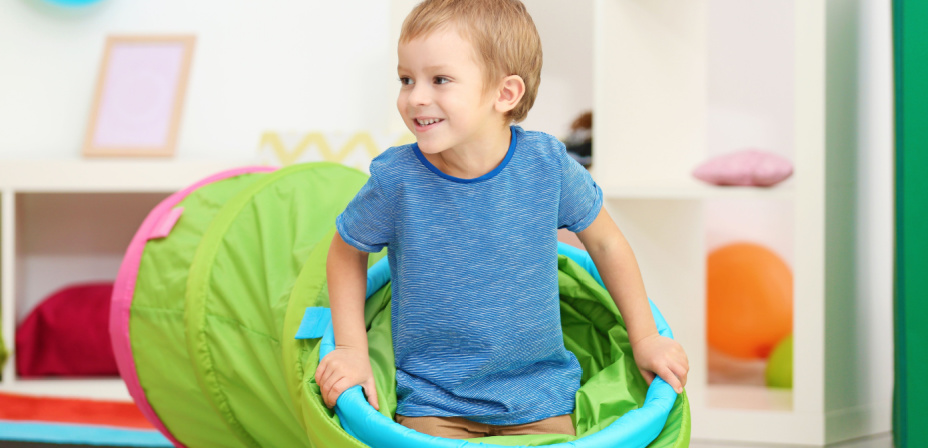 A child playing in an obstacle course. 