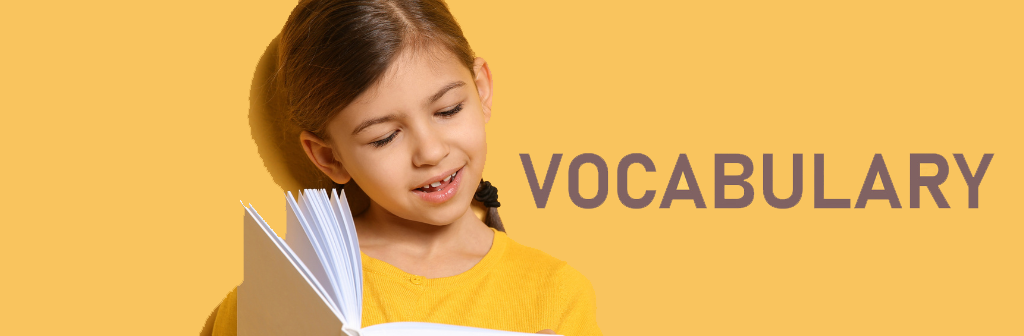 A girl reading a book and the word vocabulary across a yellow background. 