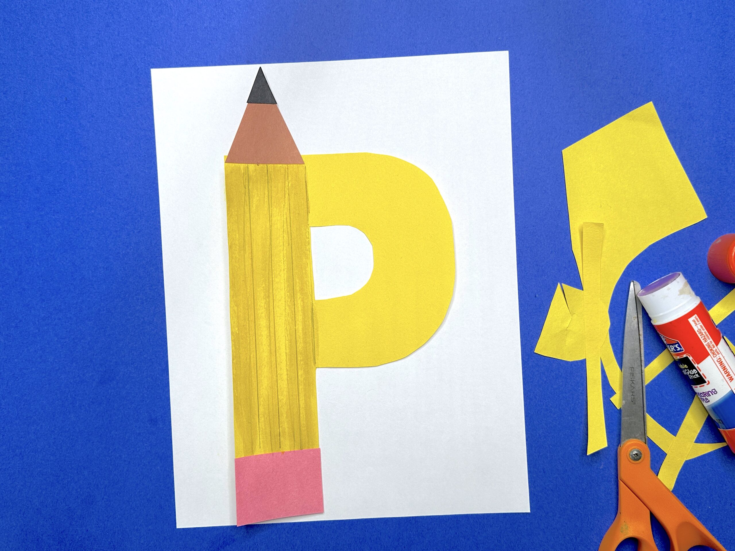 Letter P craft designed to look like a yellow pencil with a pink eraser and sharpened tip.