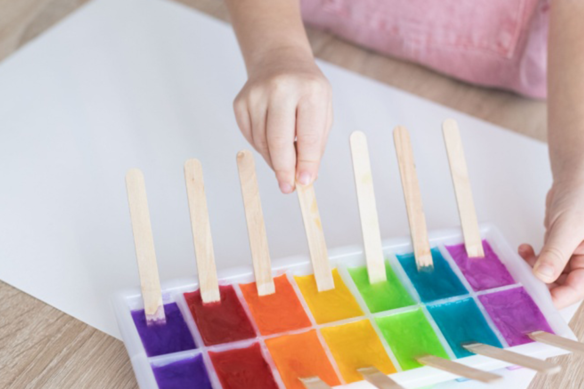 Ice painting with bright colors  for a fun summer activity. 
