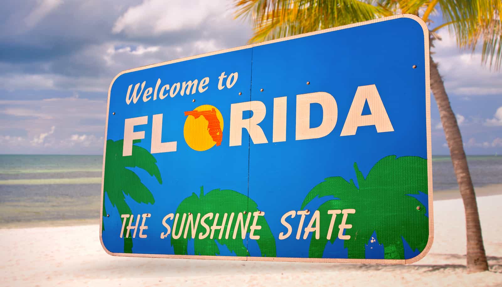 Welcome to Florida the sunshine state sign. 