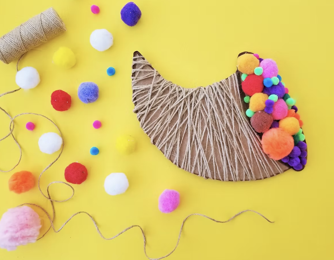 Twine wrapped cornucopia fun Thanksgiving craft for kids. 