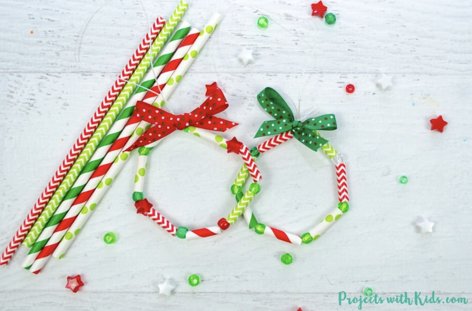 Fun paper straw craft activity made to look like Christmas wreaths. 