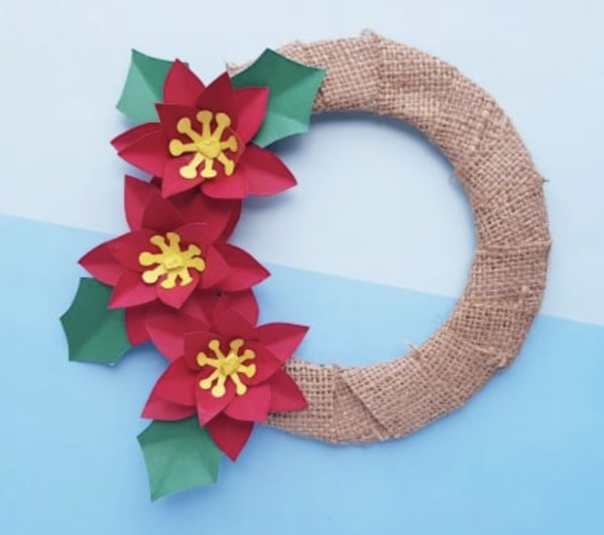 A burlap Christmas wreath craft for kids to create for a fun holiday craft. 