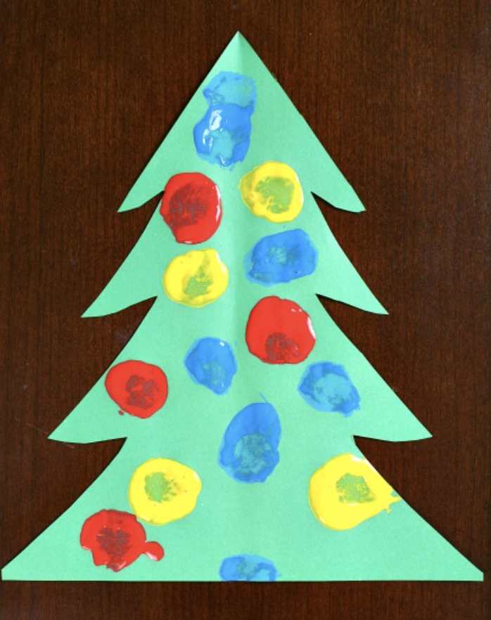 Fun pom pom painted Christmas tree craft for kids to make for the holidays. 