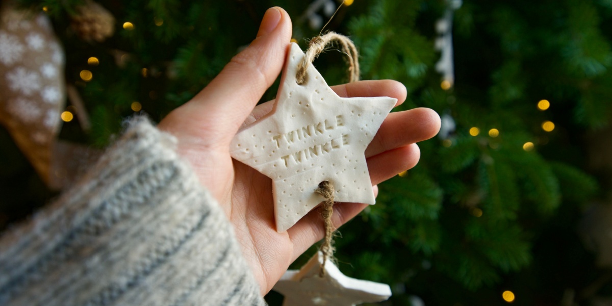 A salt dough star ornament that says 'twinkle, twinkle' on it for a fun indoor activity.