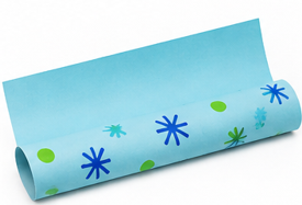 Light blue rolled paper decorated with blue starburst shapes and green dots, shown as a craft material or decorative background piece for a handmade project.