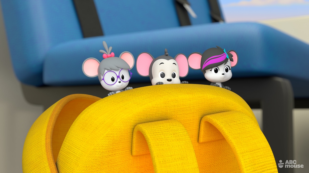 Three animated mouse characters peek over a bright yellow backpack in a colorful 3D classroom setting, with the ABCmouse logo in the corner.