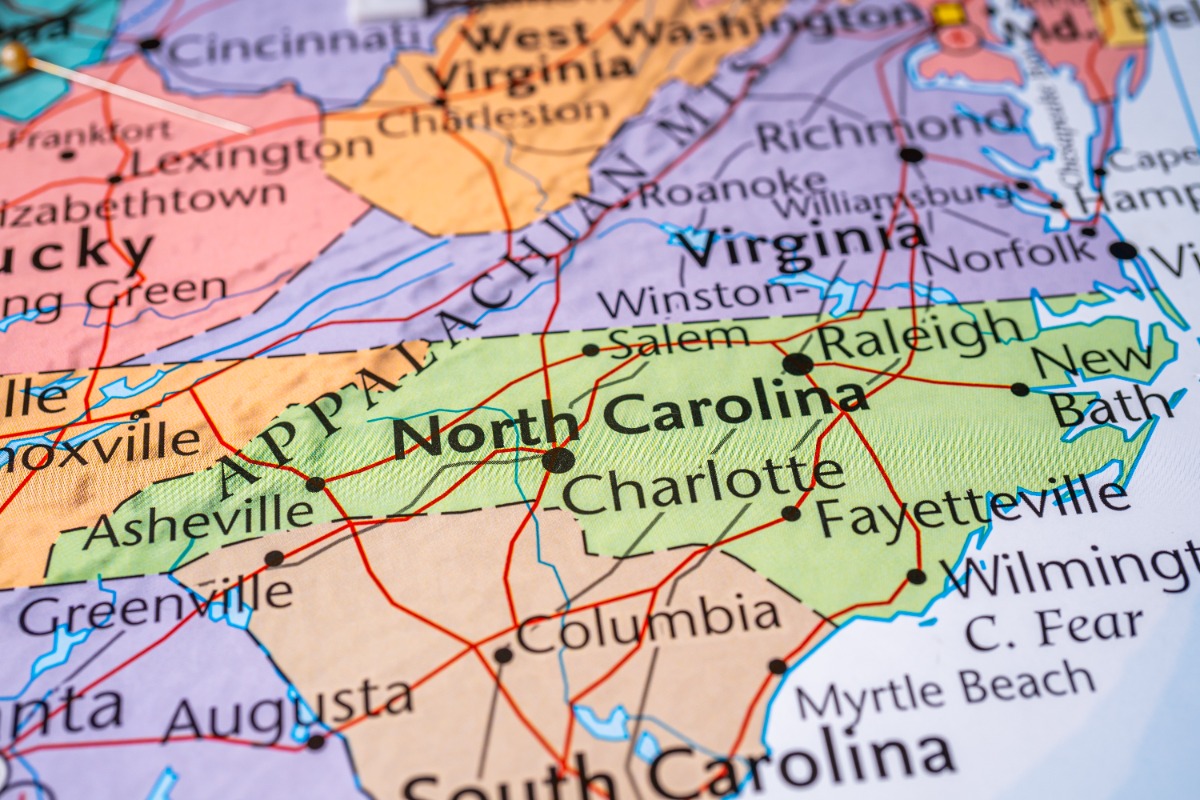 Close-up map showing North Carolina with cities like Charlotte, Raleigh, Asheville, and Greensboro; surrounding states and roads visible.
